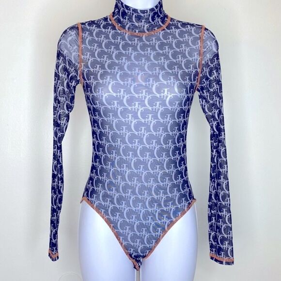 Forever 21 Tops - NEW…Black/White sheer bodysuit size S (small) from Forever21